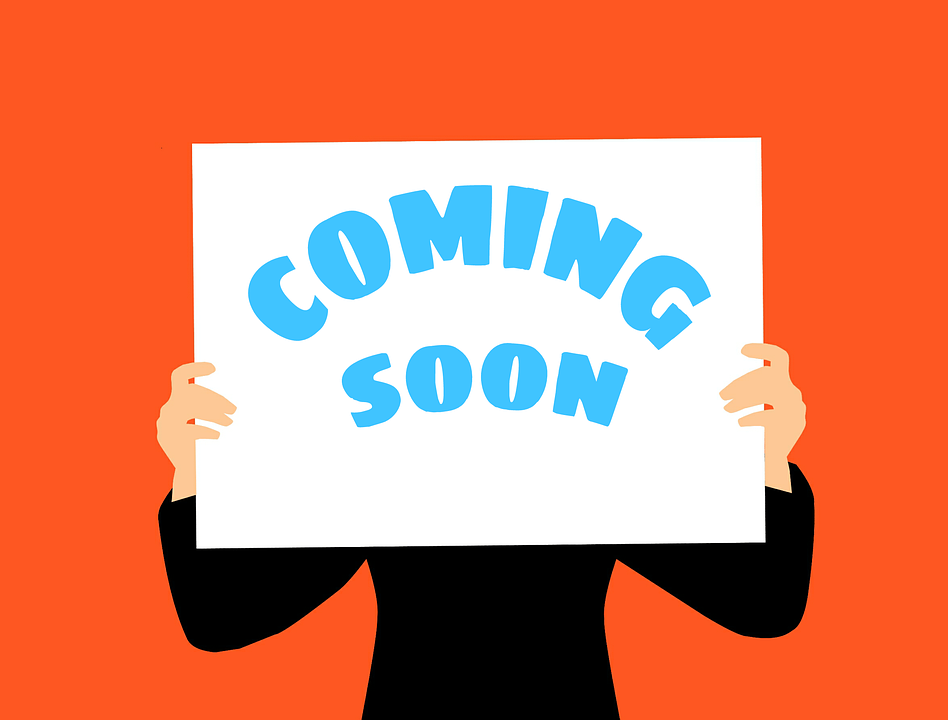 Illustration showing a person holding a "Coming Soon" sign.