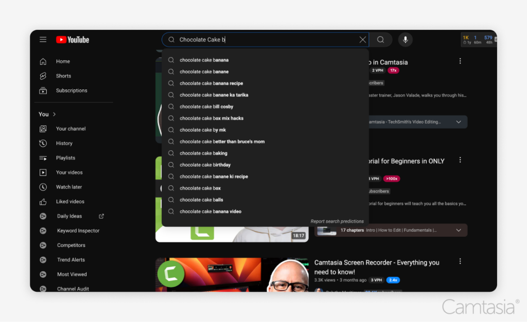 A YouTube search interface with the query 'Chocolate Cake b' entered, showing search suggestions like 'chocolate cake banana,' and 'chocolate cake box mix hacks.'