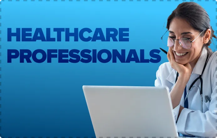 Healthcare professional at a desk with a laptop, representing TechSmith thirty percent discount for healthcare workers on Camtasia, Audiate, and Snagit.
