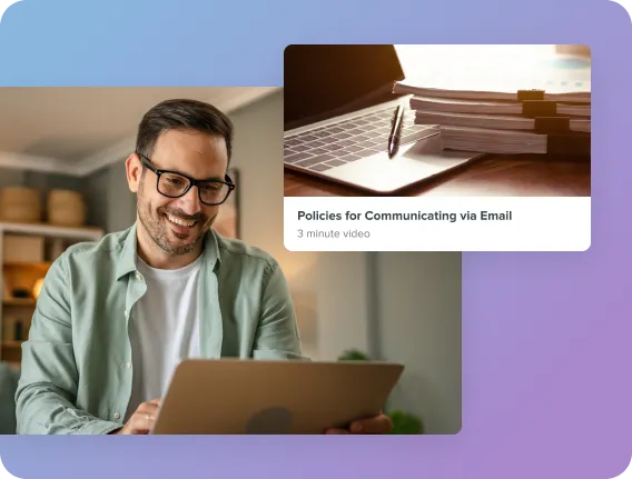 Person using a laptop while viewing a short training video titled “Policies for Communicating via Email.”